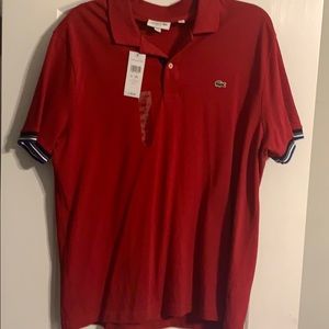 Red Lacoste shirt